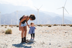 Mother talking to her little daughter 