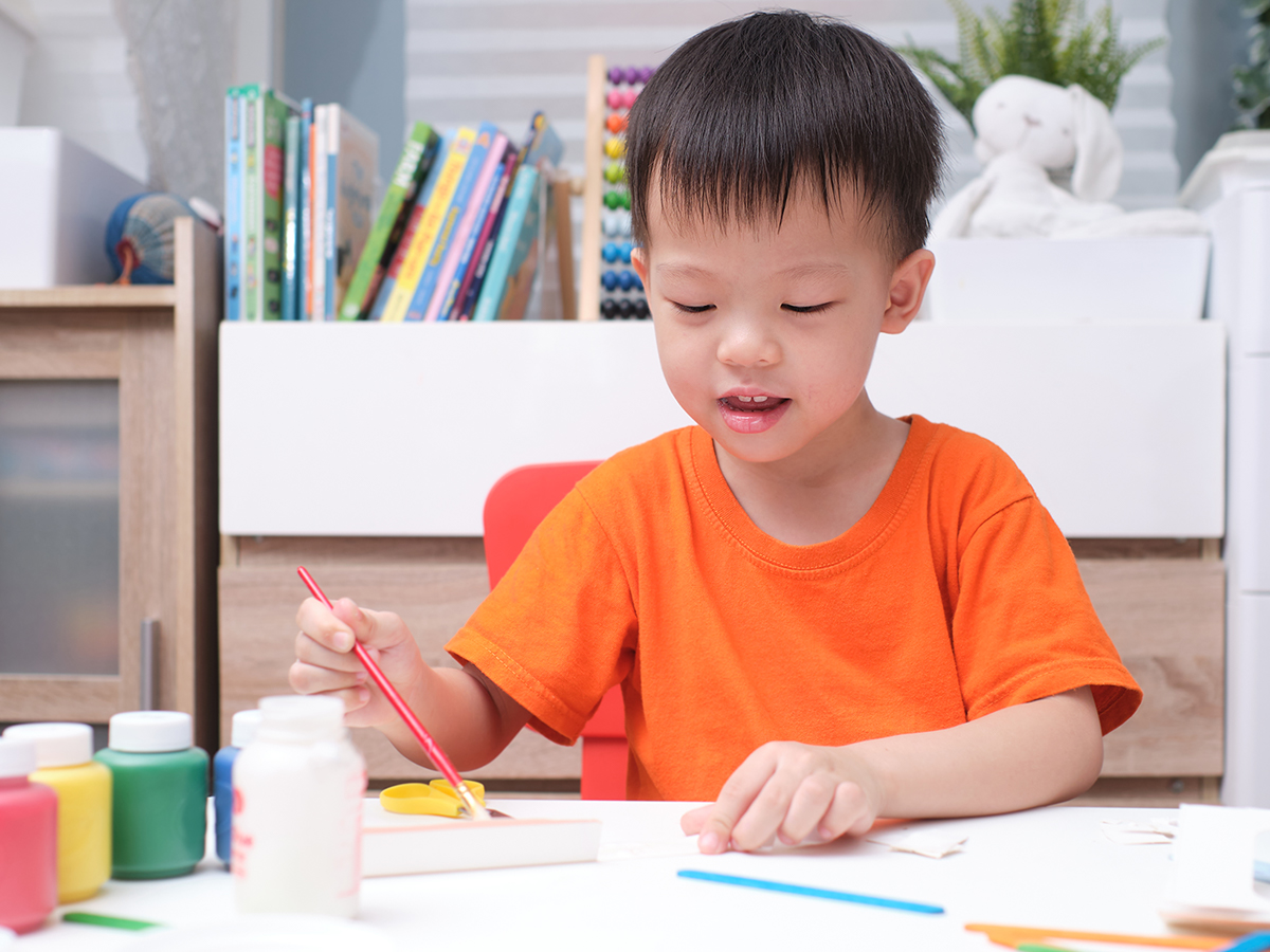 Toddler boy painting