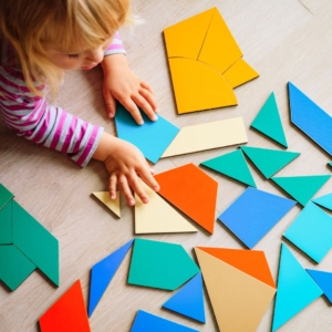 a girl sorting shapes