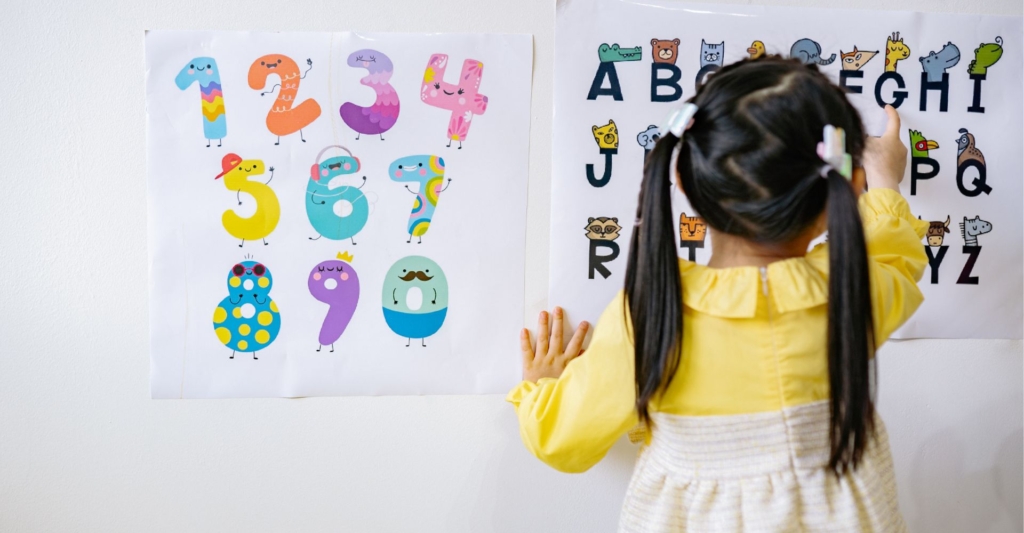 preschooler working on alphabet