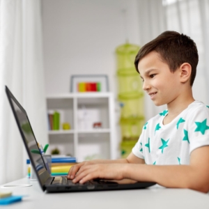 boy using computer