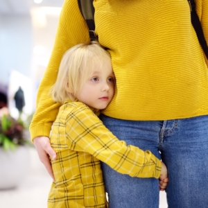 Young girl hugging her mom