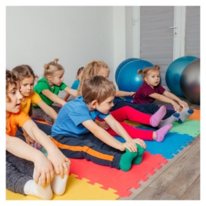 preschoolers stretching in class